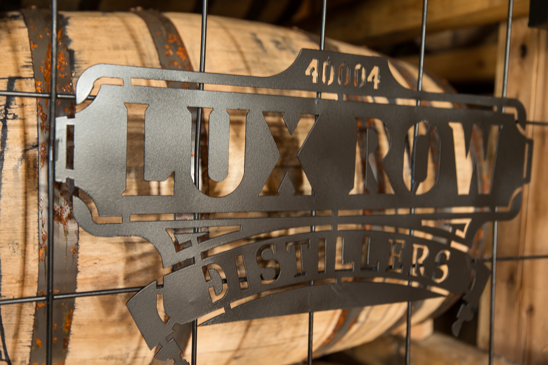 lux-row-distillers-metal-sign